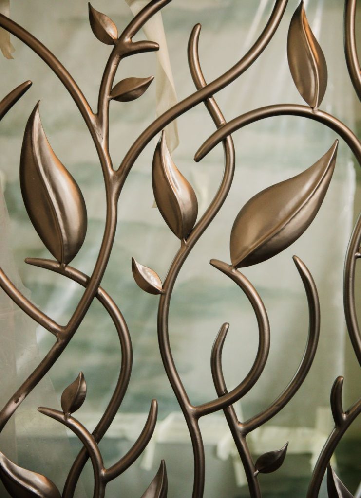 Decorative metal leaf grill in restaurant