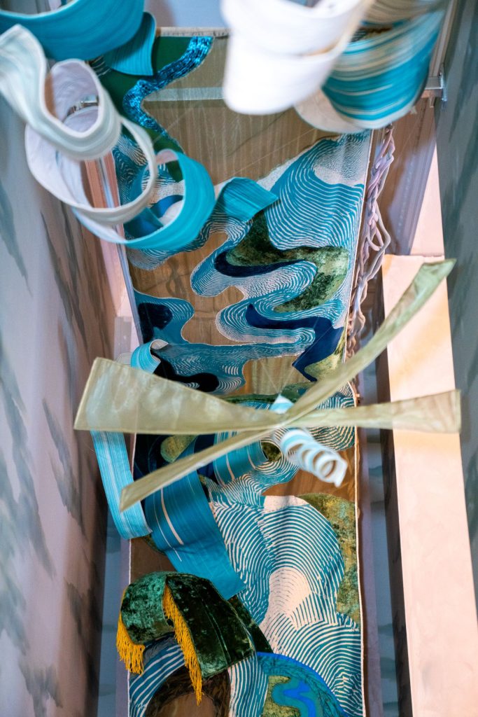 Procession / Descent (2025). Mixed-media suspended soft sculptures and textiles.