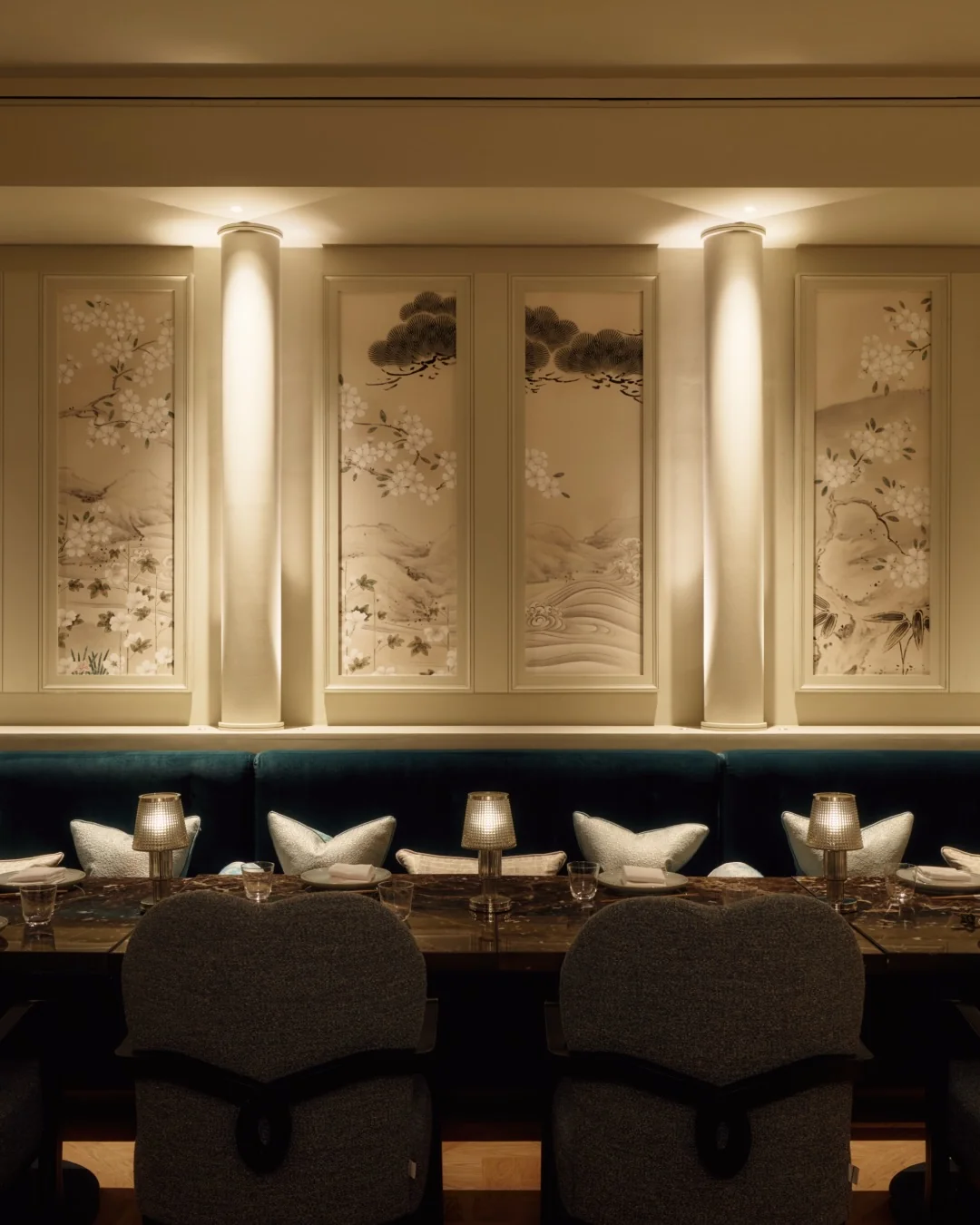 The Atrium private dining room with floor-to-ceiling mirrors and Art Deco lamps at Aki London — versatile space for seated dinners and standing receptions