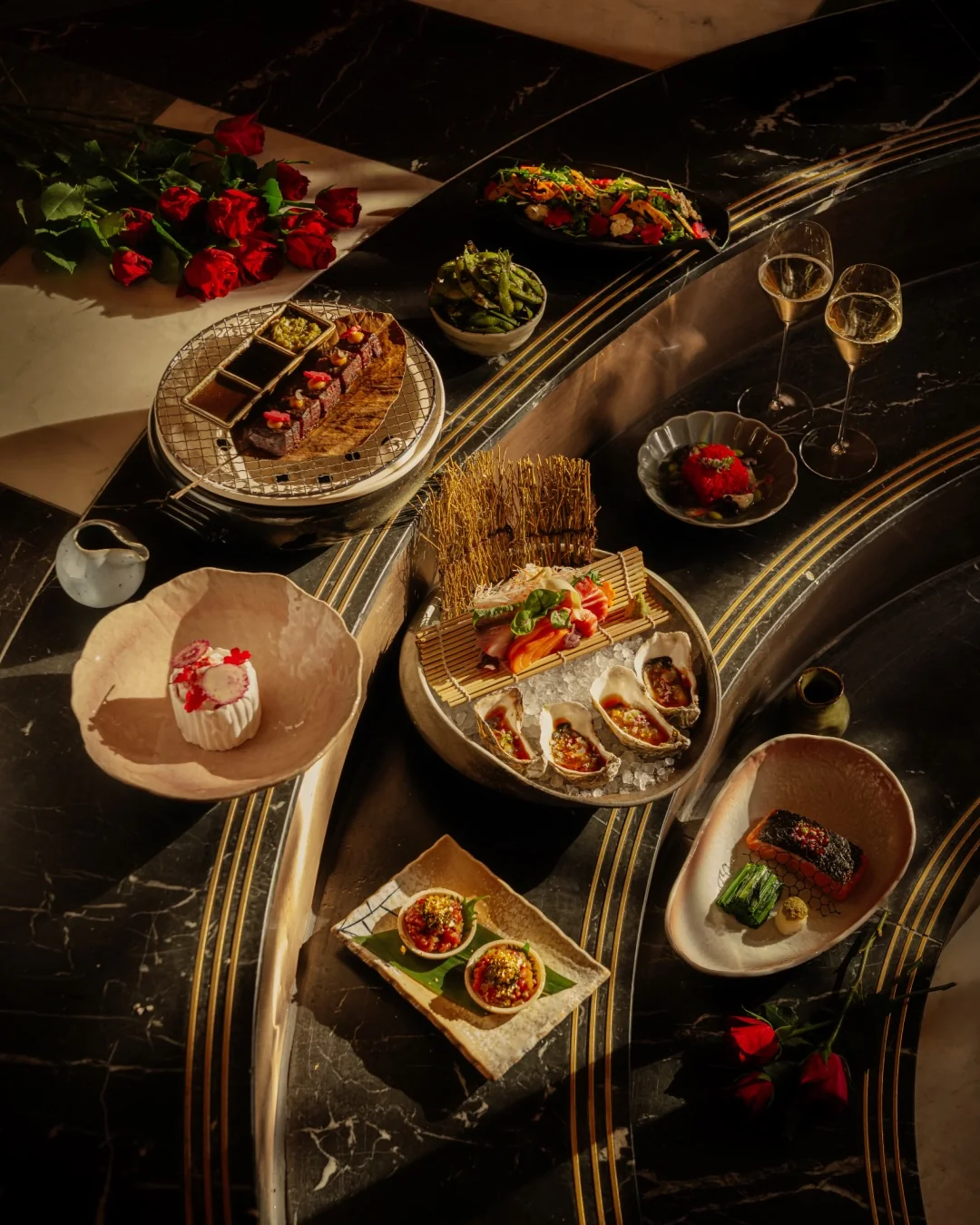 Japanese event menu platter with nigiri, sashimi, and champagne at Aki London — catering for private terrace hire, from the Ume and Matsu menus